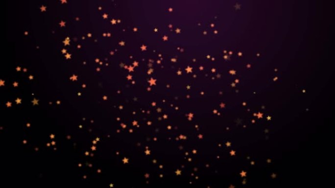 黑色背景上漂浮的温暖发光的橙色斑点的动画