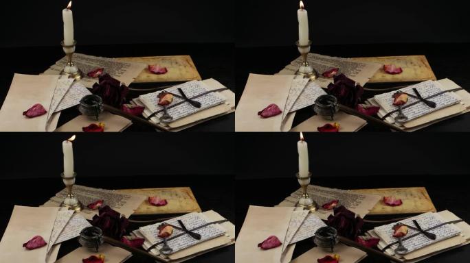 蜡烛，干玫瑰和旧家庭档案
