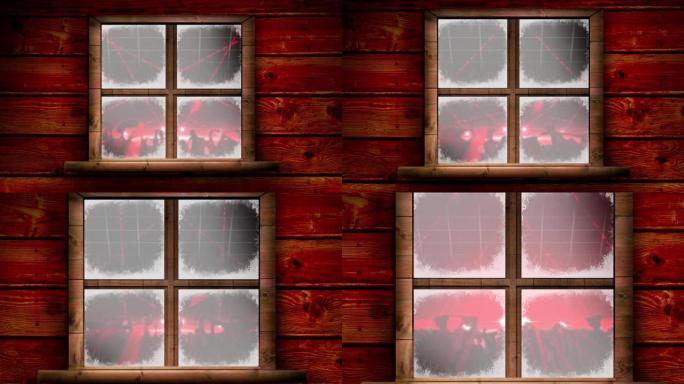 红色迪斯科舞厅的木制窗框在人们跳舞的轮廓上