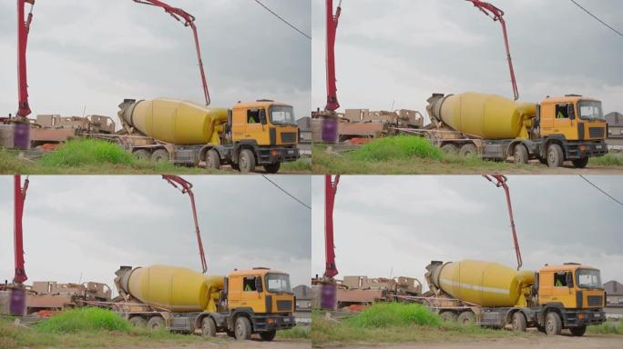 混凝土卡车在建筑工地卸载混凝土