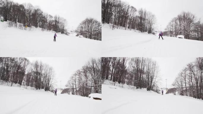 女孩在马其顿马夫罗沃滑雪中心的斜坡上滑雪