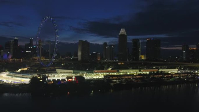 黄昏时间照明新加坡城市著名滨海湾空中全景
