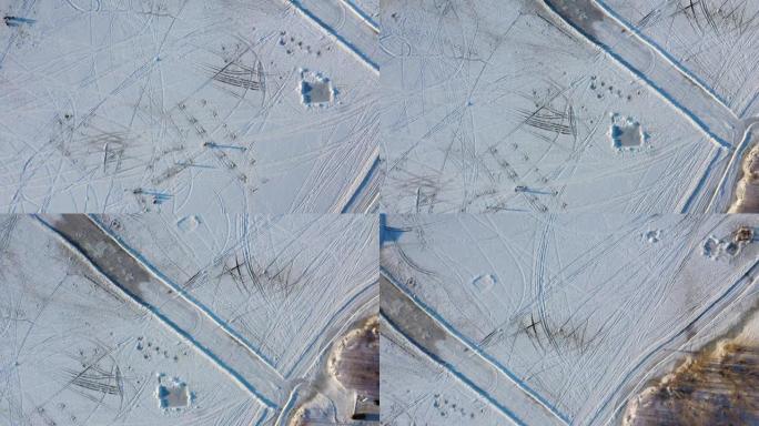 高空中无人机视角在白雪覆盖的冰河中拍摄各种轨道，覆盖着拉瓦尔西部伯格斯-德-夸特雷斯-通风口
