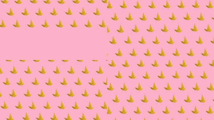 粉红色背景上无缝图案的多个秋季枫叶图标的数字动画