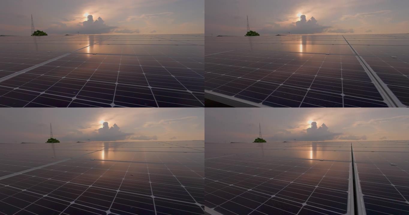 近看当代光伏太阳能电池。可再生能源的太阳能电池板已经排成一排。太阳能电站面板在日落时的生态学概念