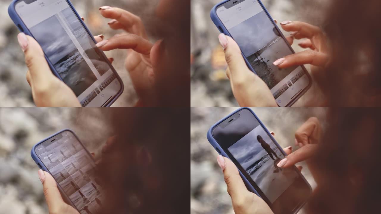 女人的手指在手机的图片库中滑动