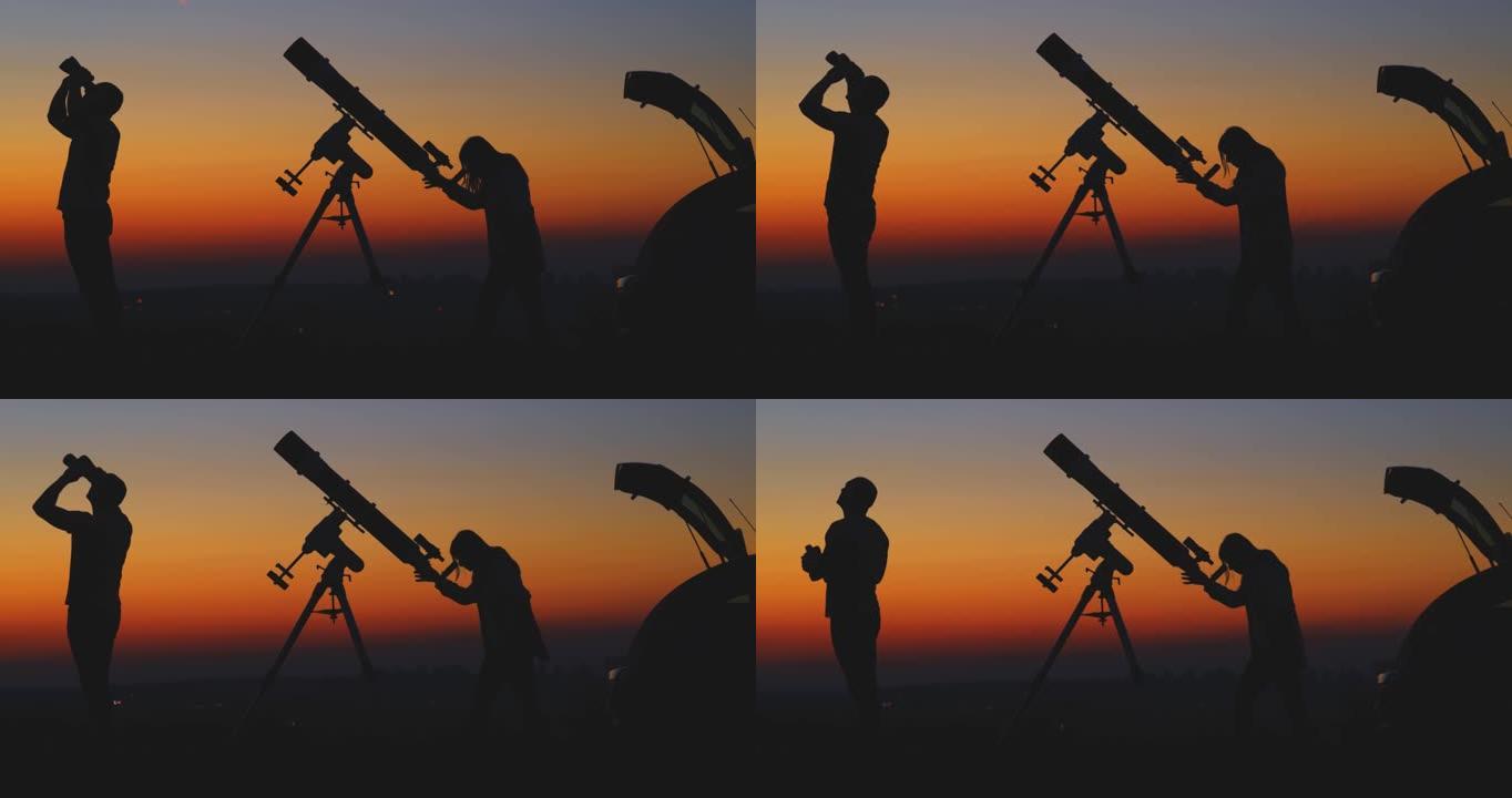 夫妇用天文望远镜一起观星。