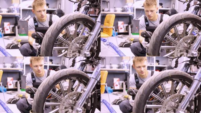 男子大师在摩托车4k电影中检查轮胎压力