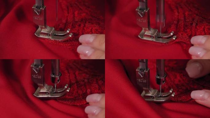 裁缝将红色镂空织物缝在工作室的连衣裙上的特写镜头。