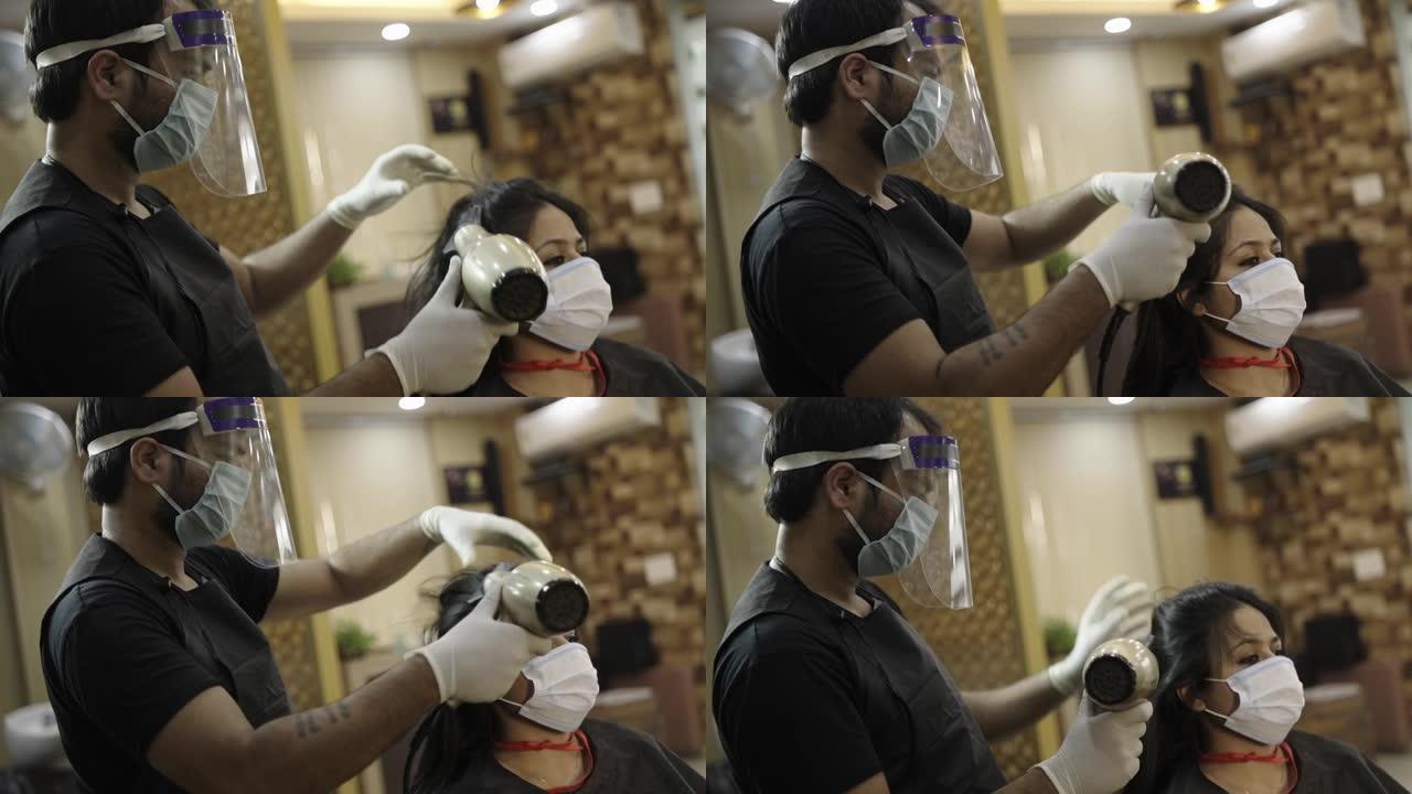 一名水疗中心男性工作人员戴着口罩，给女客户理发