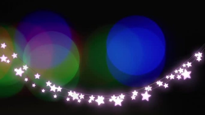 黑色背景上的光点和星星的动画