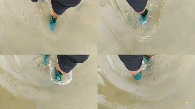 穿着靴子在洪水中行走