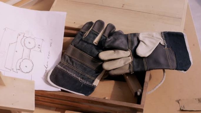 木材车间工作手套的背景。