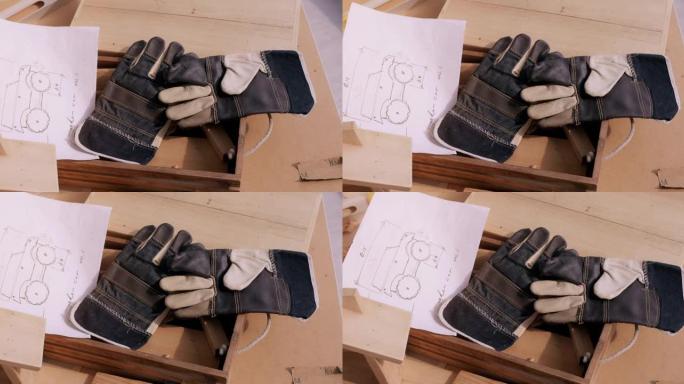 木材车间工作手套的背景。