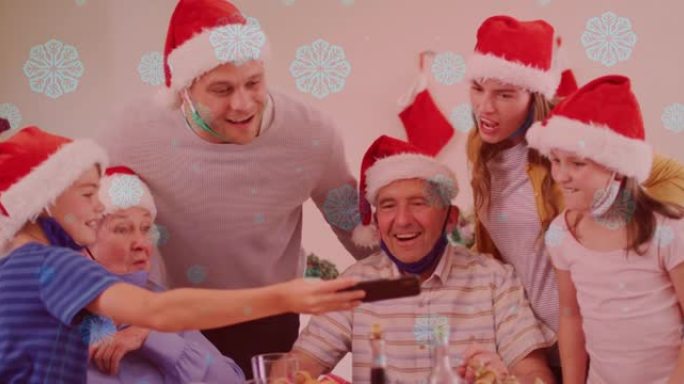 使用智能手机的雪花落在带着圣诞老人帽子的微笑的高加索家庭上的动画