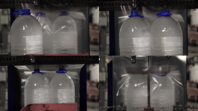饮用水生产。装满聚乙烯的瓶子送超市