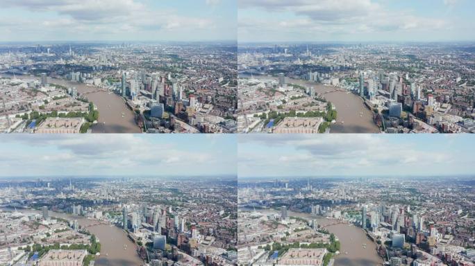 泰晤士河沿岸各种建筑物的鸟瞰图。一家银行的高层现代办公楼和另一家住宅区的下层公寓楼。英国伦敦