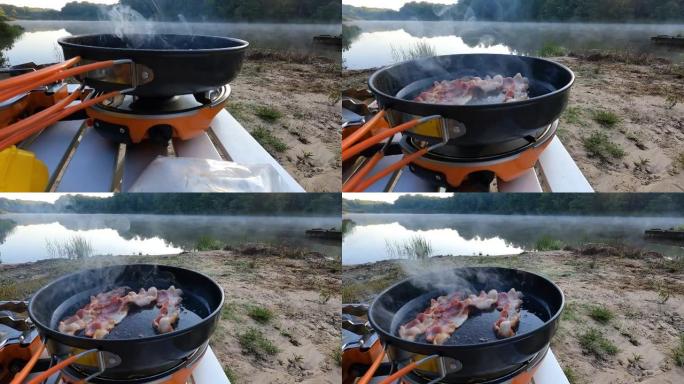 早上在湖边露营地煎培根