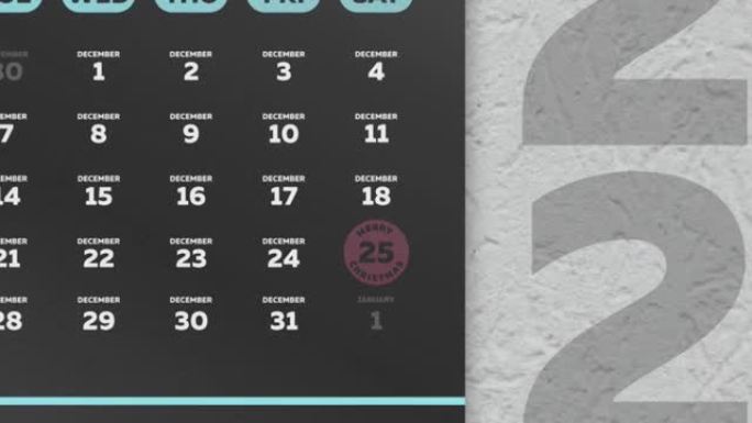 相机在挂历2021的美丽黑色12月页面上放大标记圣诞节日期