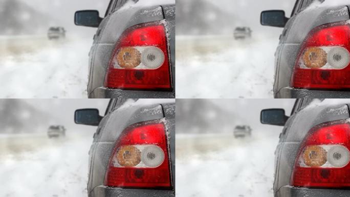 汽车在暴风雪和能见度不佳的冬季道路上行驶，报警信号