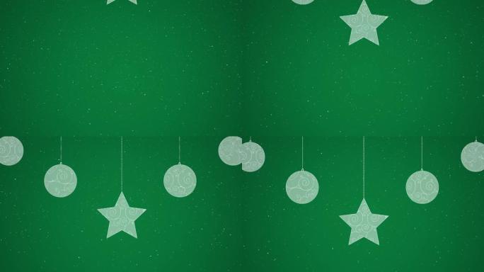 绿色背景上的圣诞节装饰品上的雪的动画