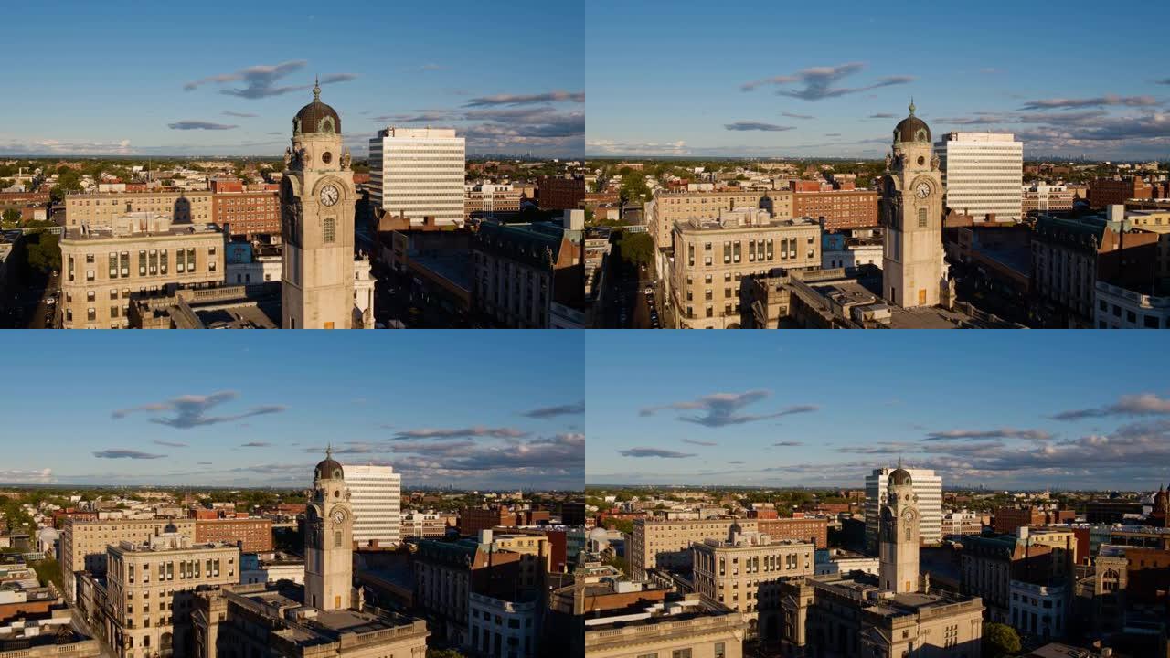 帕特森市议会，帕特森，新泽西州，一个阳光灿烂的日子。航拍视频与向后平移摄像机运动。