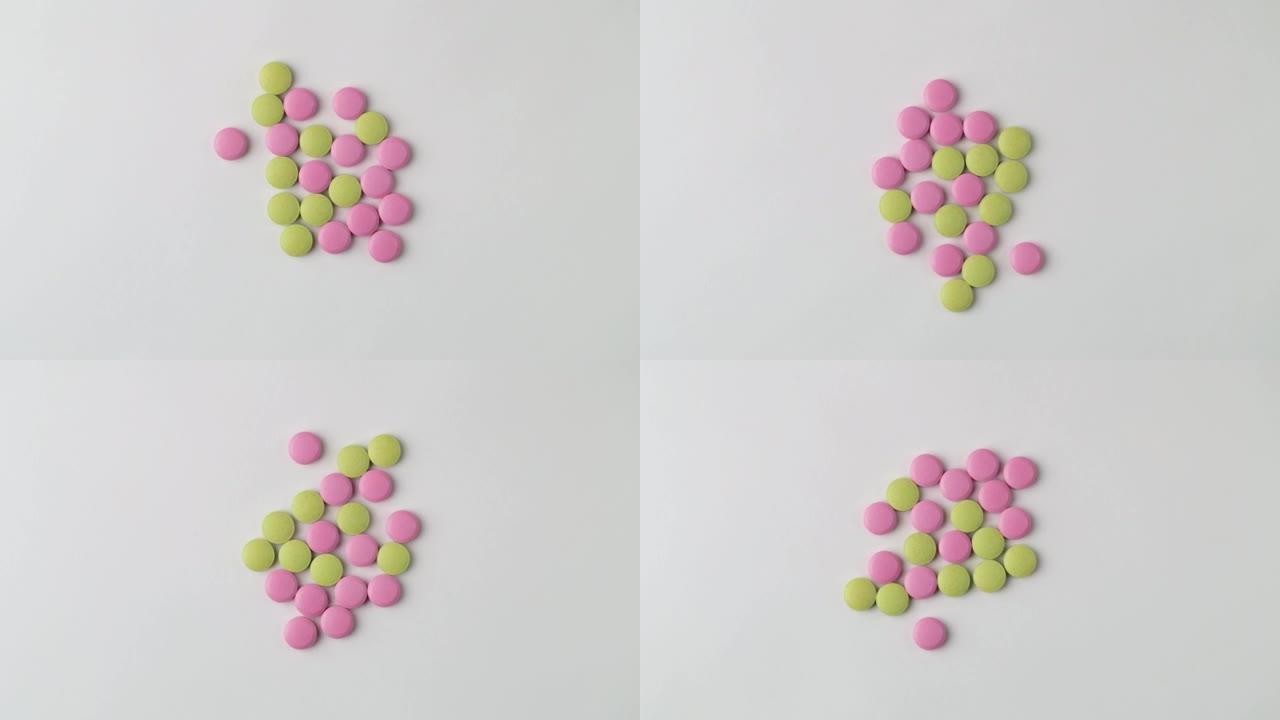 医学概念。多色药物背景。不同的彩色补救措施，药丸，抗生素和维生素在白色背景上旋转。