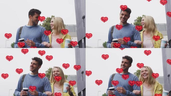 心脏图标的动画漂浮在快乐的高加索夫妇散步和喝外卖咖啡