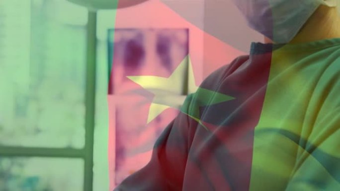喀麦隆国旗在手术室挥舞着外科医生的动画