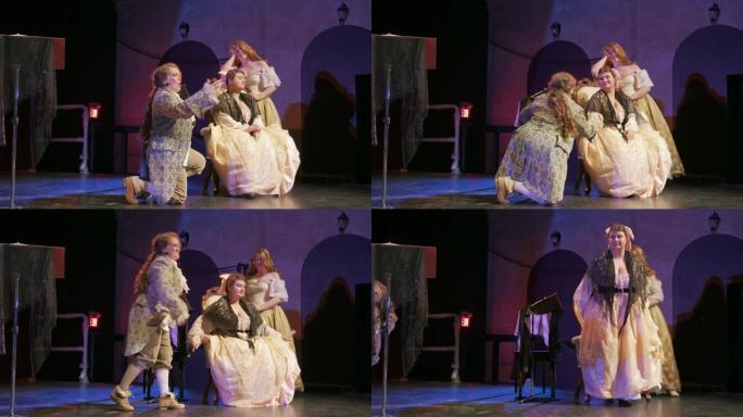 戏剧舞台上穿着古装的三位女演员