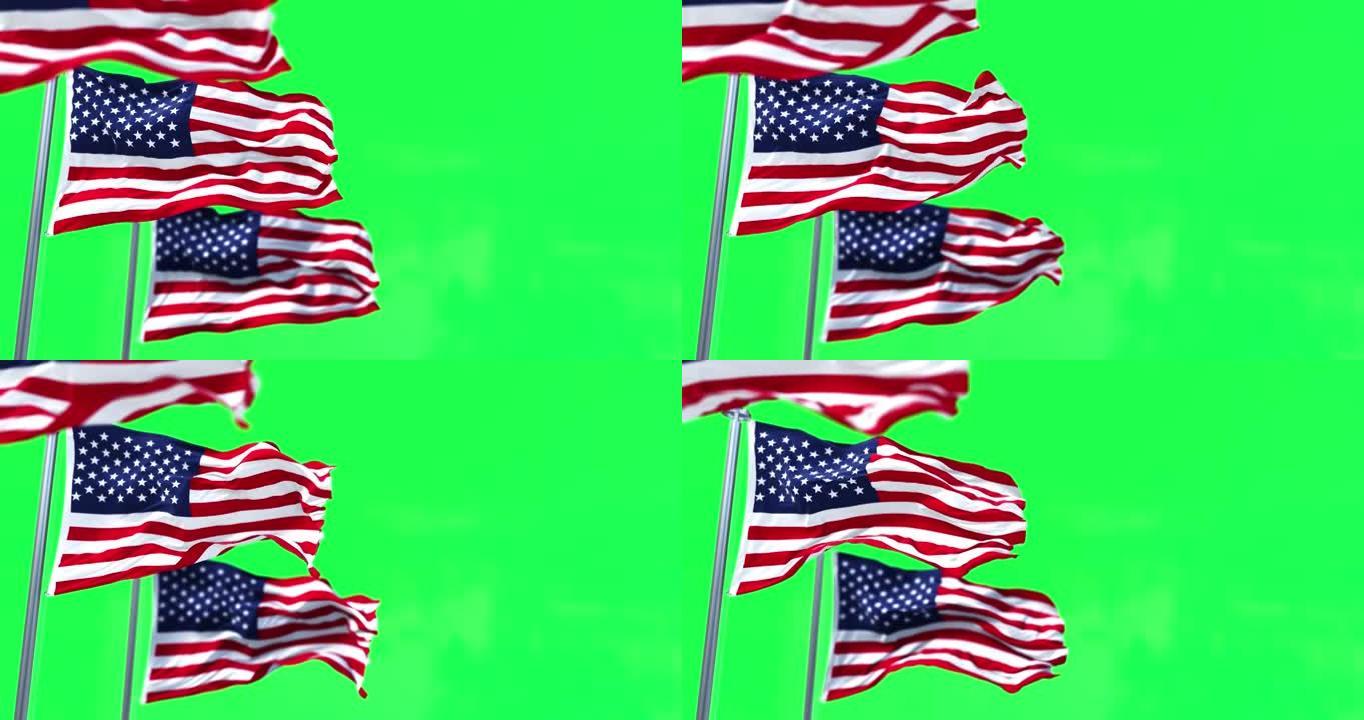 三面美国国旗迎风飘扬，绿幕为背景