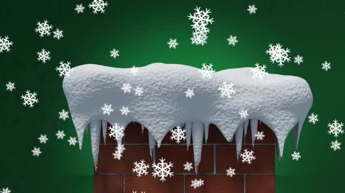 雪花落在绿色背景下的积雪覆盖的砖墙烟囱上