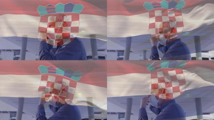 在covid 19大流行期间，克罗地亚国旗挥舞着戴着口罩的男子的动画