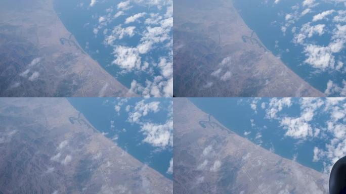 旅行时从窗户飞机看布朗山和土地的鸟瞰图