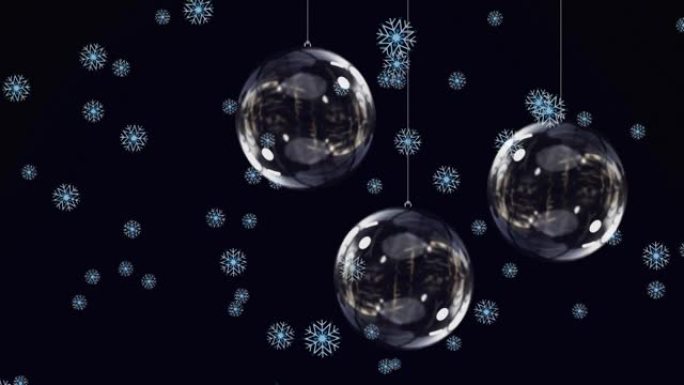 黑色背景上的雪落在玻璃圣诞小玩意上的动画