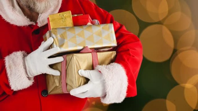 圣诞老人在橙色光点上拿着圣诞礼物的动画
