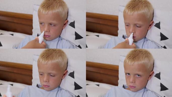 一位有爱心的母亲在床上在家用鼻喷剂喷儿子的鼻子。