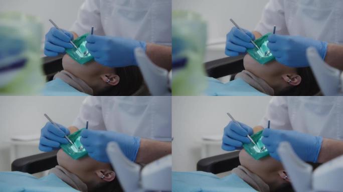 充填病人牙齿的根管。