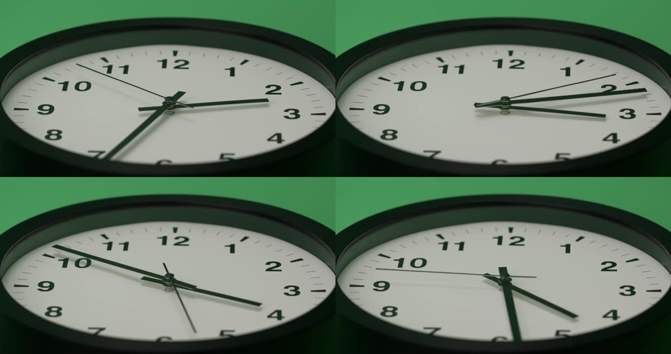 黑色挂钟在绿色背景上隔离，开始时间凌晨2点。