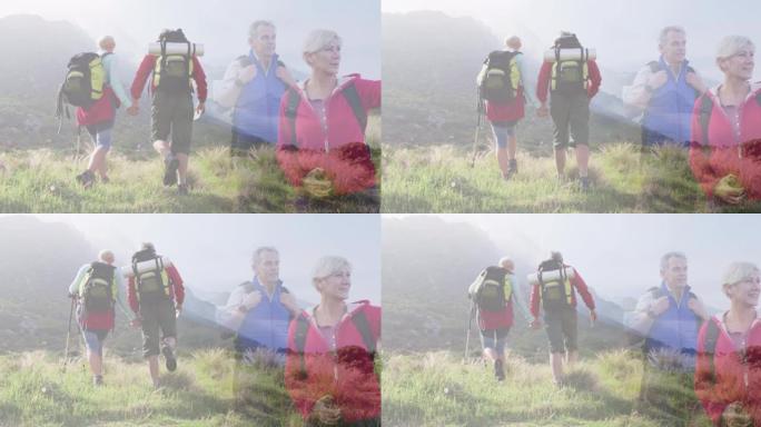 两对快乐的高加索高级夫妇在乡村徒步旅行的综合