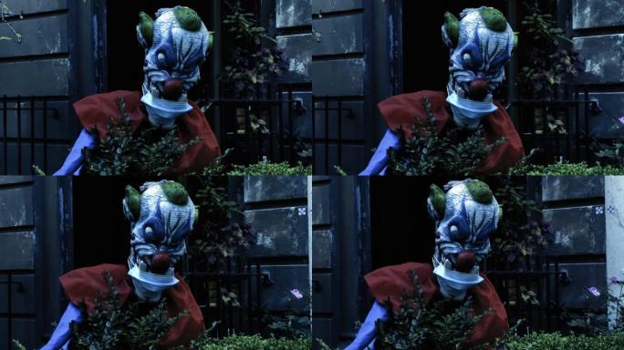 可怕的邪恶小丑怪物万圣节展示设置屋外令人毛骨悚然的白天妖精