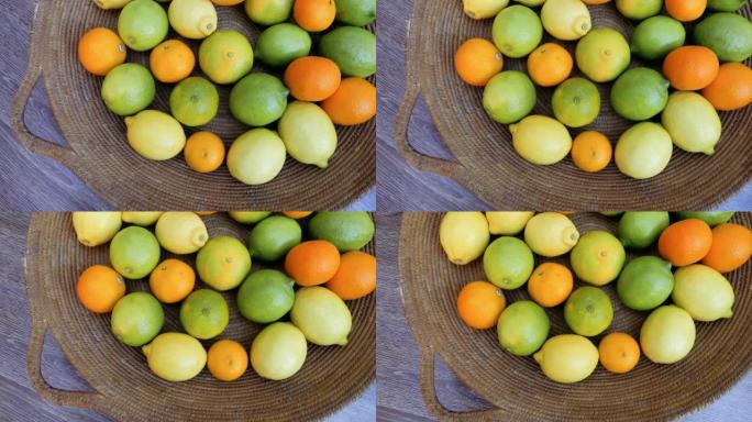 柑橘类水果，柠檬，橘子，放在古董篮子里。维生素c，健康清爽，天然有机食品生活方式背景。