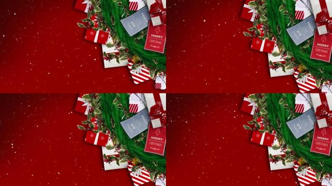 雪落在红色背景下的圣诞花环装饰品、卡片和礼物上