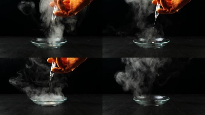 高锰酸钾过氧化氢分解反应。KMno4和H2O2混合化学反应产生的烟雾效应。黑色背景上的危险实验