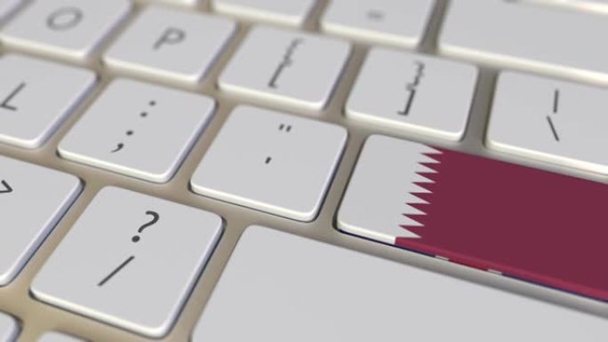 电脑键盘上带有卡塔尔国旗的键切换到带有大不列颠国旗的键，翻译或重新定位相关动画