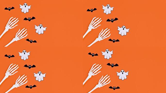 鬼魂和蝙蝠绕着骷髅手飞翔。万圣节停止运动