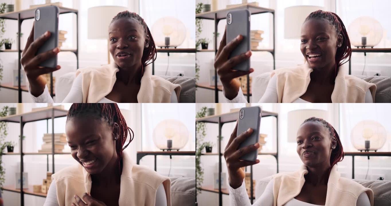 幸福女人在家用手机视频聊天