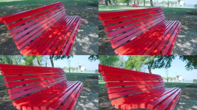 布拉诺的城市公园里涂着鲜艳的红色长凳