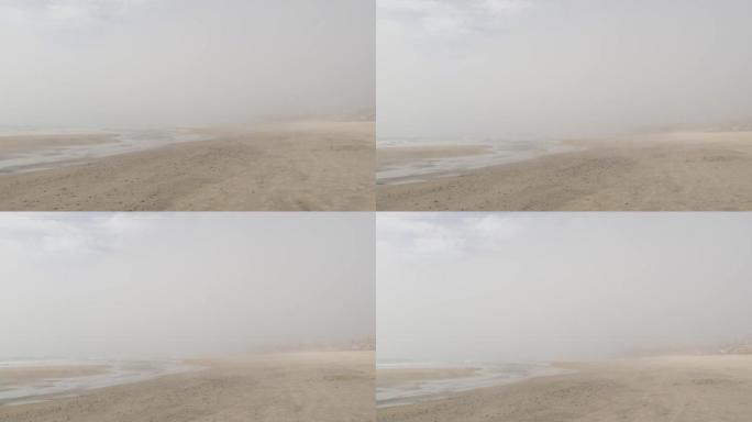 美国加利福尼亚州桑迪·米斯蒂海滩。太平洋海岸海边浓雾。乳白色烟雾布卢姆雾霾
