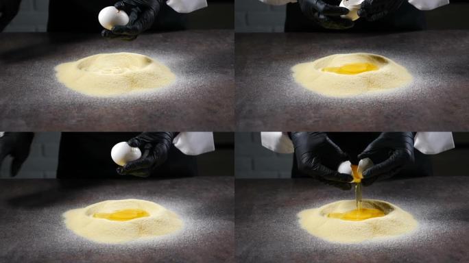 雌性手将鸡蛋打碎成面粉或粉末。在家庭厨房制作面食或糕点的面团时，将生鸡蛋裂解。食物视频。面包师揉面做